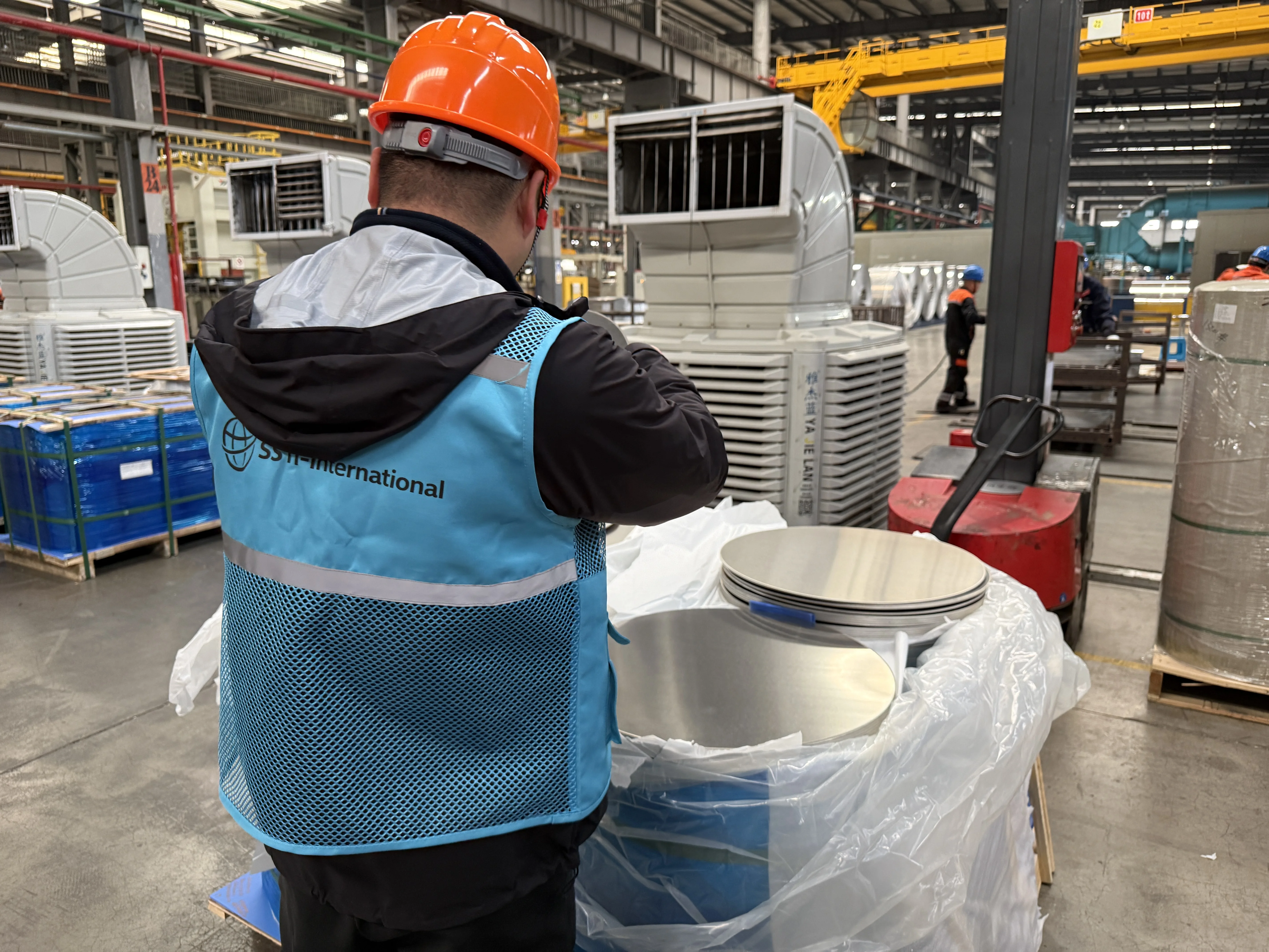 Carton marks and labels being checked before shipment